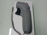 a wii remote in the box on the table