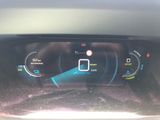 the dashboard of a car with a digital display on it