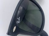 a pair of sunglasses that are laying on a table