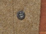 a close up of a button on a jacket