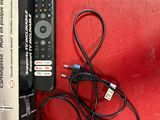 a remote control sitting on top of a red table