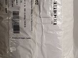 a roll of toilet paper that is wrapped in plastic