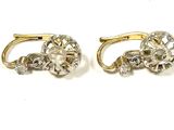two pairs of gold and diamond earrings on a white background