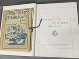 un livre ouvert sur une page où figure l'image d'une maison