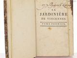 an old book opened to reveal a page with writing on it