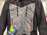 the jacket is hanging on a hanger in a store