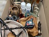 a box full of assorted items sitting on a table
