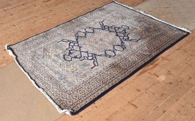 a rug on the floor that has a design on it