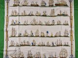 une photo d'une nappe verte sur laquelle sont représentés des bateaux
