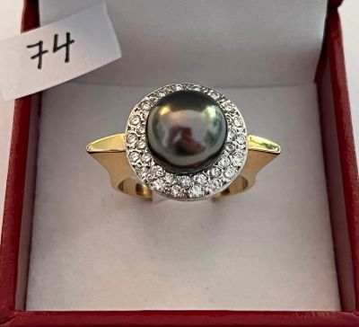 Bague 2 ors, rehaussée d’une perle noire de Tahiti, dans un …