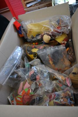 a box full of toys and other items in it