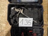 a box with tools in it sitting on the floor