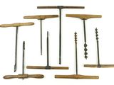 several different types of tools are arranged on a white surface