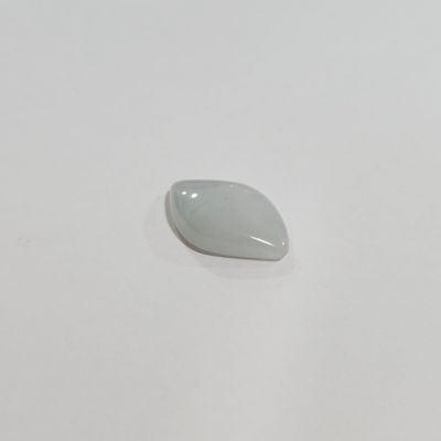an image of a piece of white jade on a white surface