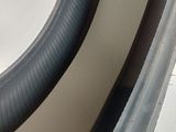 a close up of a tire on the side of a car