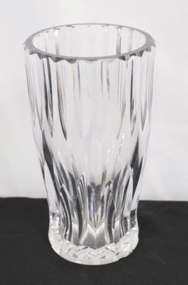 a glass vase that is sitting on a table