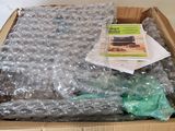 a cardboard box with a bunch of items inside of it