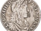 gros plan d'une pièce de monnaie sur fond blanc