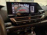 a picture of a car dashboard with a monitor on it