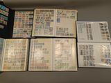 many different types of stamps on a table