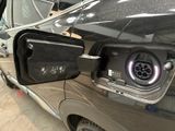a close up of an electric car with its door open