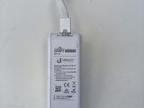 a small white device that is sitting on a table