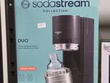 a soda stream machine on a shelf in a store