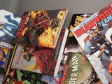 many comic books on the table together on the table
