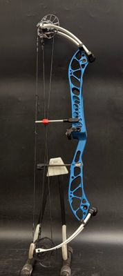 the bow is blue and has a red arrow on it