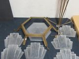 a table that has a bunch of glass items on it