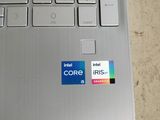 a close up of a laptop with a sticker on it