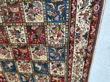 a very large rug with many different designs on it