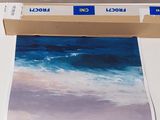 a picture of a picture of a beach on a table