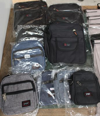 several pieces of luggage sitting on top of a wooden floor