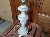 a lamp that is sitting on a small table