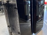 two refrigerators that are on display in a store
