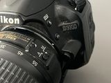 a close up of a camera with a lens attached to it