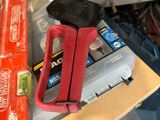 a clamp that is sitting on top of a box