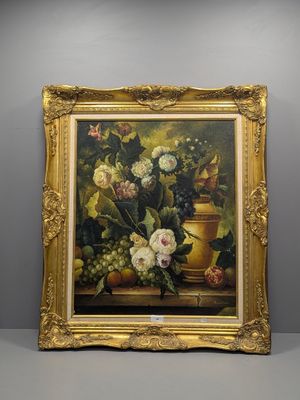 painting of a still life of flowers and fruit in a gold frame