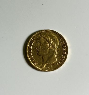 an image of a gold coin on a white surface