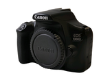 a black camera with a lens attached to it