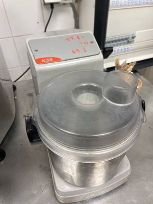 a machine that is sitting on a counter in a kitchen