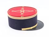a red and blue hat with a gold design on it