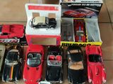 a lot of toy cars that are sitting on the floor