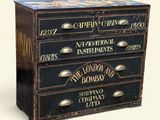 a chest of drawers that has a lot of drawers on it