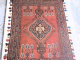 a picture of a rug on a table with a price tag on it