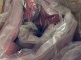 a plastic bag full of items that are sitting on a table