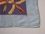 a picture of a cloth with a picture of a dragon on it