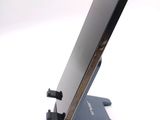a cell phone that is sitting on top of a stand