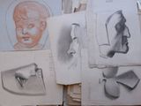 a bunch of drawings that are on a table